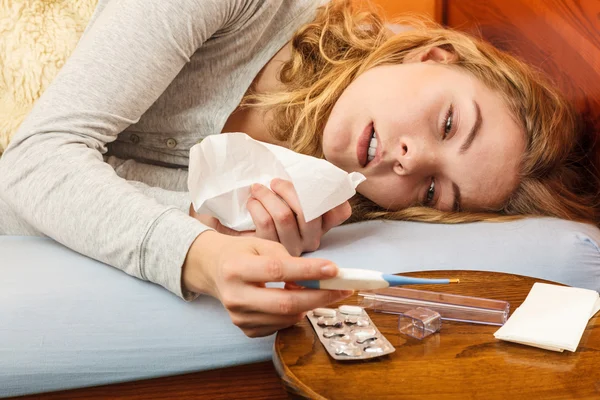 Sick woman laying in bed — Stock Photo, Image