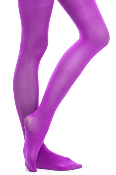 Woman slim legs and violet stockings isolated — Stock Photo, Image