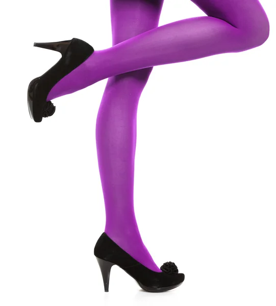 Женщина длинные ноги и фиолетовые чулки изолированы — стоковое фото