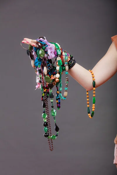 Closeup of woman with jewelry necklaces beads. — Stock Photo, Image