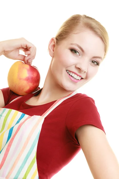 Housewife offering red apple — Stockfoto