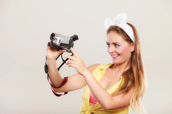 Girl filming with camcorder. — Stock Photo, Image