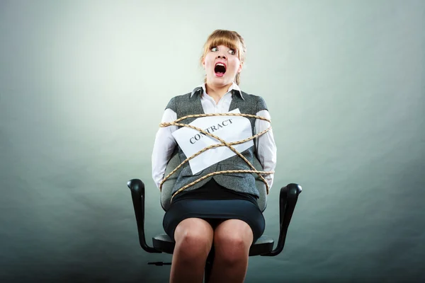 Afraid businesswoman bound by contract terms. — Stock Photo, Image