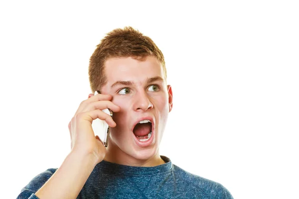 Young man talking on mobile cell phone — Stock Photo, Image