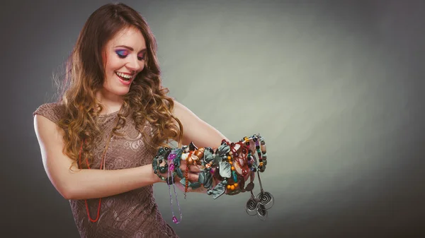 Woman holding necklaces — Stock Photo, Image