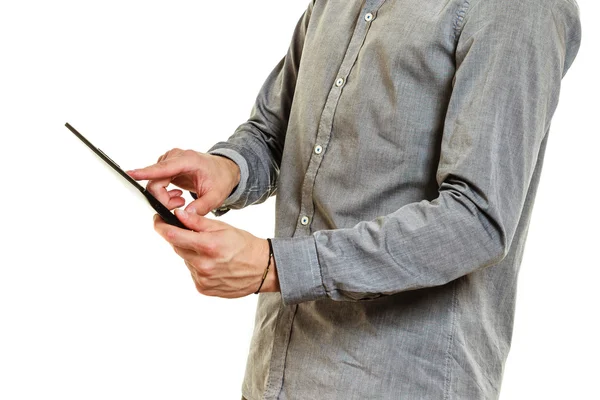 Closeup of human using pc tablet browsing internet — ストック写真