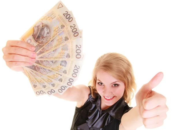 Business woman holds polish money giving thumb up — Stock Photo, Image