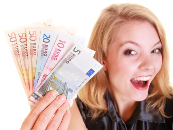 Economy finance. Woman holds euro currency money. Stock Photo