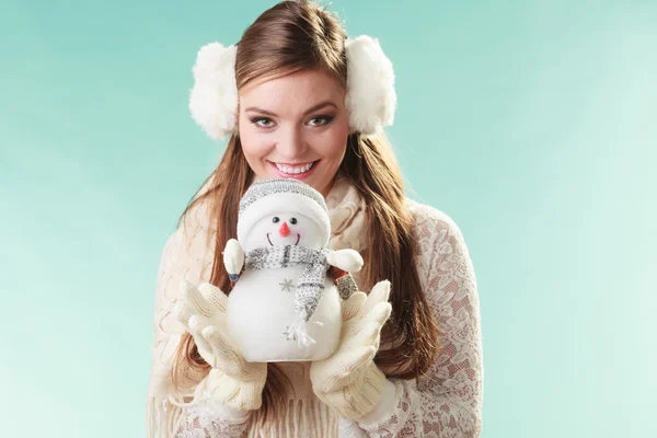 Woman holding  little snowman. — Stock Photo, Image