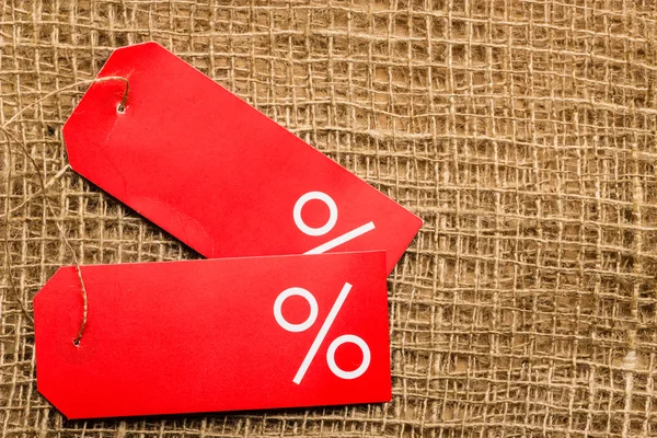 Etiqueta de precio rojo con signo por ciento — Foto de Stock