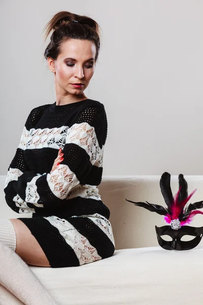 Woman with carnival  mask sitting — Stock Photo, Image