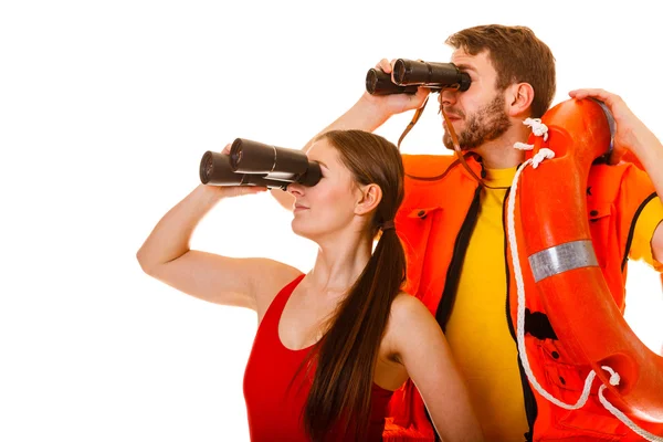 Lifeguards with ring buoy and life vest. — 图库照片