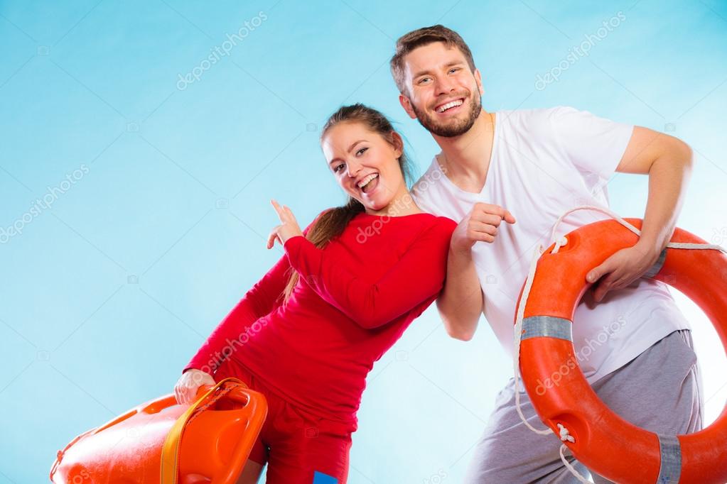 Lifeguards on duty with equipment — Stock Photo © Voyagerix 88439512