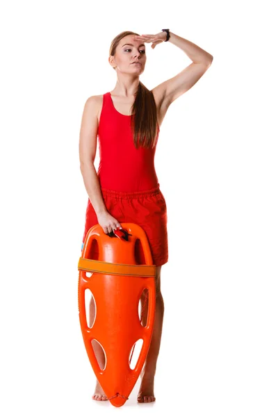 Lifeguard with rescue buoy supervising. — Stock Photo, Image