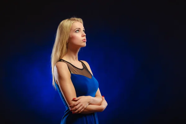 Woman in evening dress looking up — Stock Photo, Image