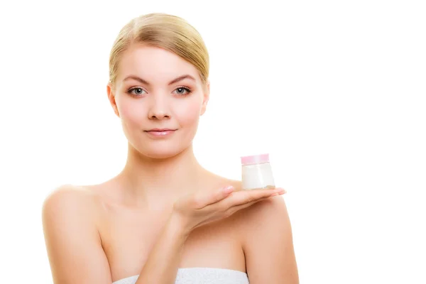 Woman holding cosmetic lotion jar — 스톡 사진