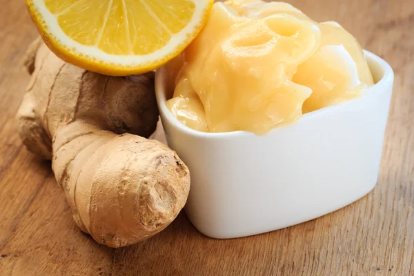 Ginger root, honey and lemon on wooden rustic table. — Stock Photo, Image