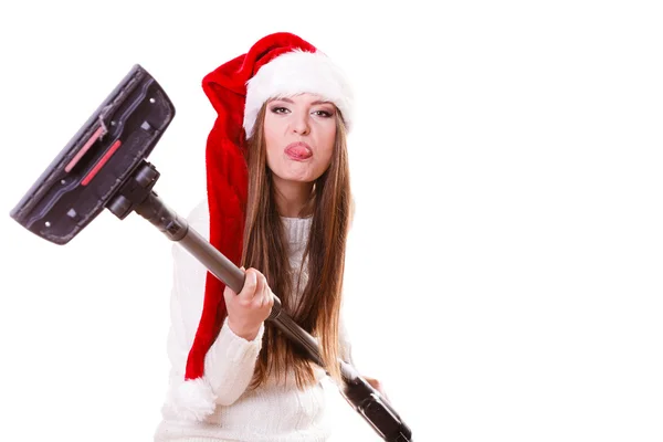 Girl santa claus hat with vacuum cleaner — Stock Photo, Image