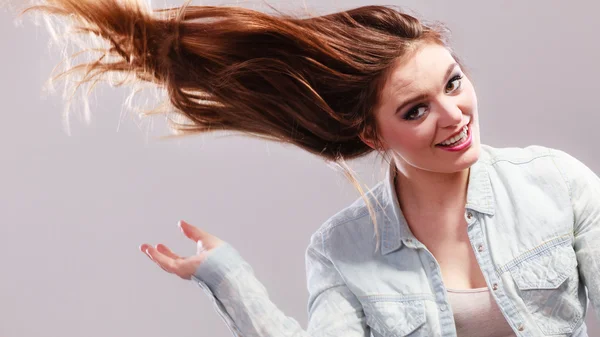 Fashionable girl with long hair blowing — Stock Photo, Image