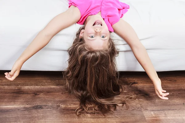 Little girl on sofa — Stock Photo, Image