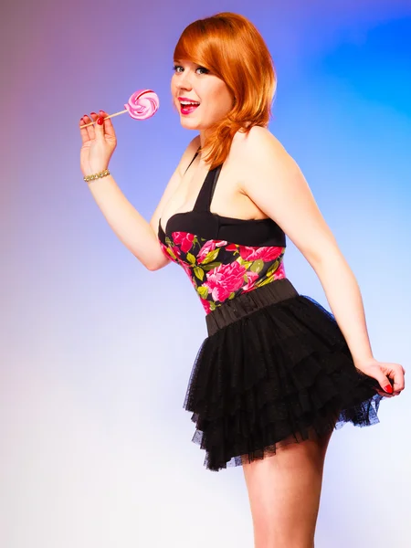 Young girl and sweet lollipop. — Stock Photo, Image
