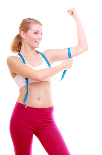 Diet. Fitness woman fit girl with measure tape measuring her biceps — Stock Photo, Image