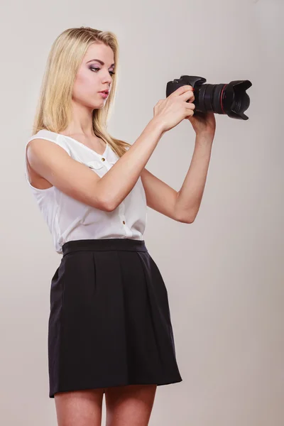 Beautiful woman with camera. — Stock Photo, Image