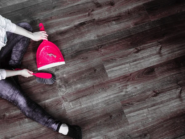 Cleaning woman sweeping wooden floor — Stock Photo, Image