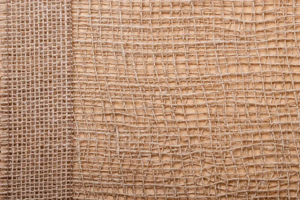 Koronki wstążką na płótnie tkaniny — Zdjęcie stockowe