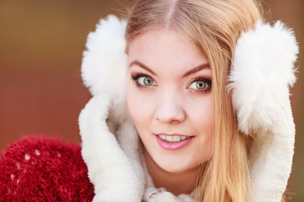 Portrait of pretty gorgeous woman in earmuffs. — Stock Photo, Image