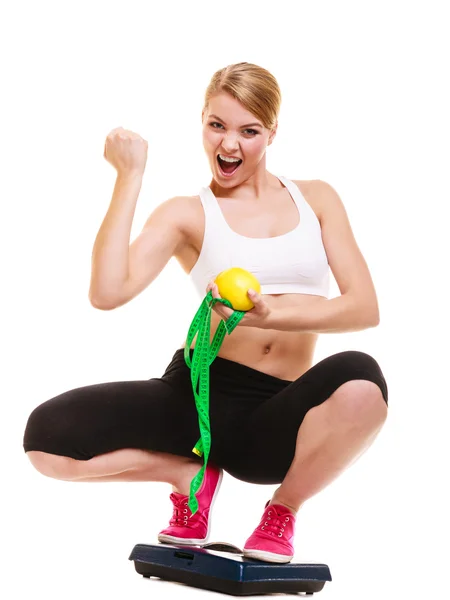 Happy successful woman weighing scale. Weight loss — Stock Photo, Image