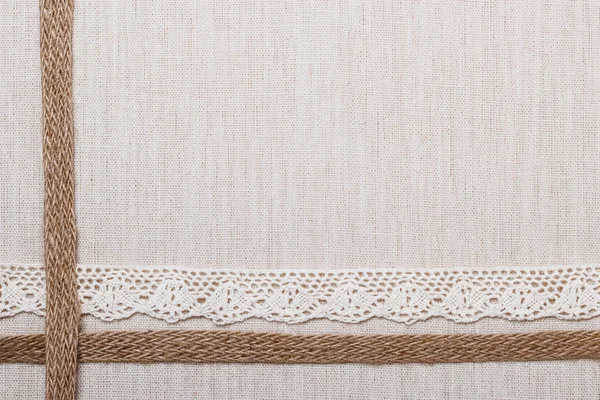 Lace frame on linen cloth background — Stock Photo, Image