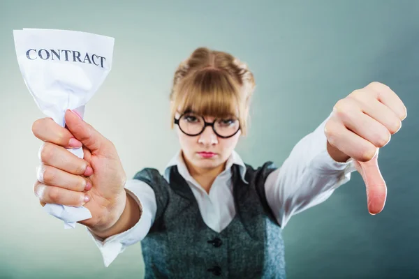 Unhappy business woman showing crumpled contract — Stock Photo, Image