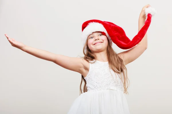 Glad liten tjej unge i santa hatt. Christmas. — Stockfoto