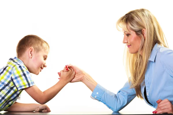 Mother and son arm wrestling. — Stock Photo, Image