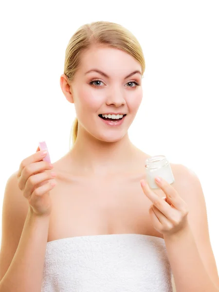 Girl applying moisturizing cream. — Stock Photo, Image