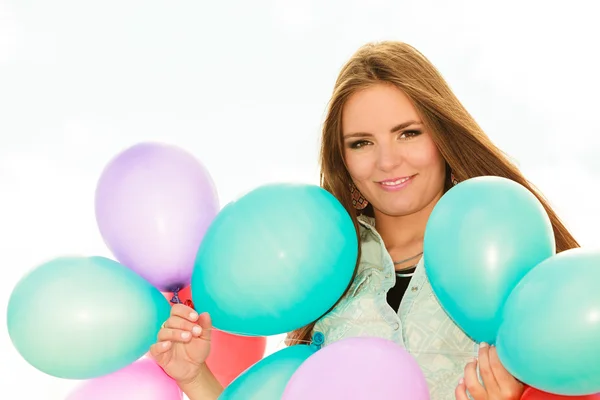 Teen girl with colorful balloons — Stock Photo, Image