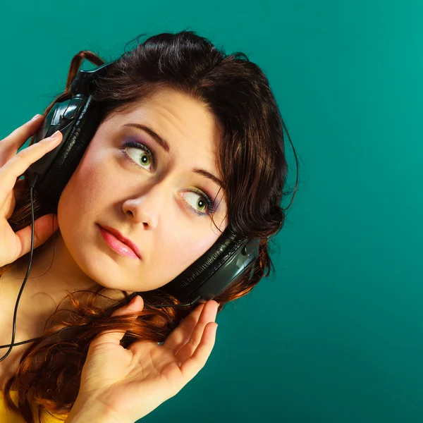Girl in big headphones listening music mp3 relaxing — Stock Photo, Image