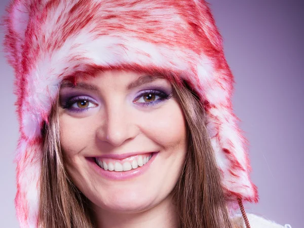 Woman in fur winter cap posing — Stock Photo, Image