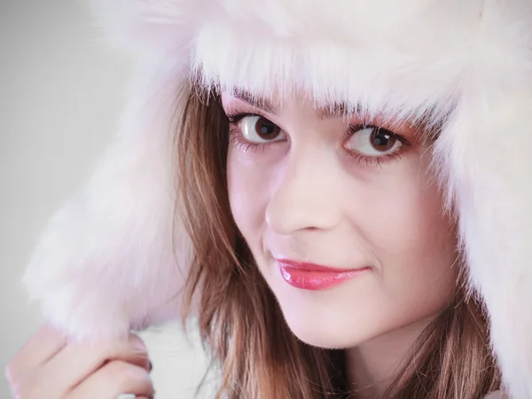 Young woman in winter clothing fur cap — Stock Photo, Image