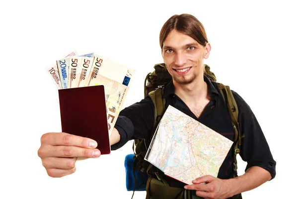 Man toeristische backpacker holding geld en paspoort. — Stockfoto