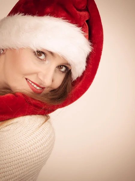 Woman wearing santa claus hat — Stock Photo, Image