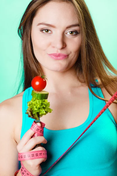 Sporty girl with vegetarian food. — Stock Photo, Image