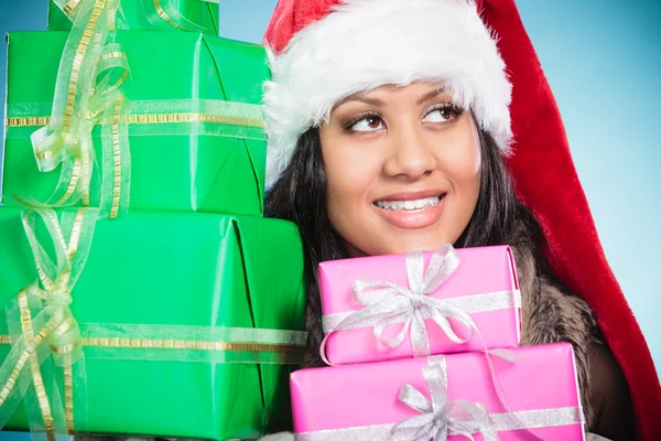 Girl holding stack of presents — Stock Photo, Image