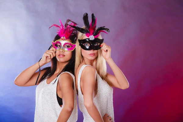 Two women with carnival venetian masks — Stock Photo, Image