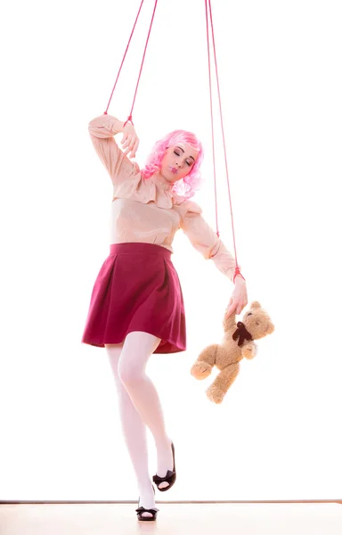 Woman girl stylized like marionette puppet on string — Stock Photo, Image