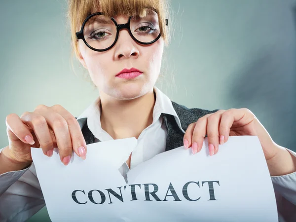 Unhappy business woman showing crumpled contract — Stock Photo, Image