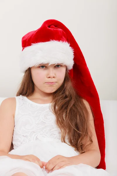 Sad little girl kid in santa claus hat. Christmas. — 스톡 사진