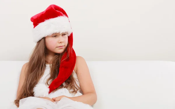 Little girl kid in santa claus hat. Christmas. — Stock Photo, Image