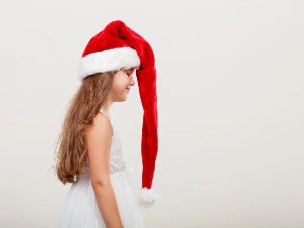 Kırmızı Noel Baba şapkalı kız — Stok fotoğraf